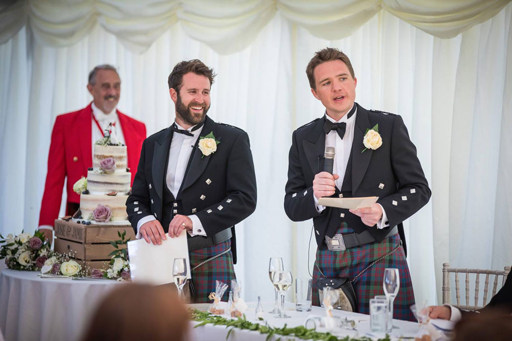 Toastmaster with two Grooms