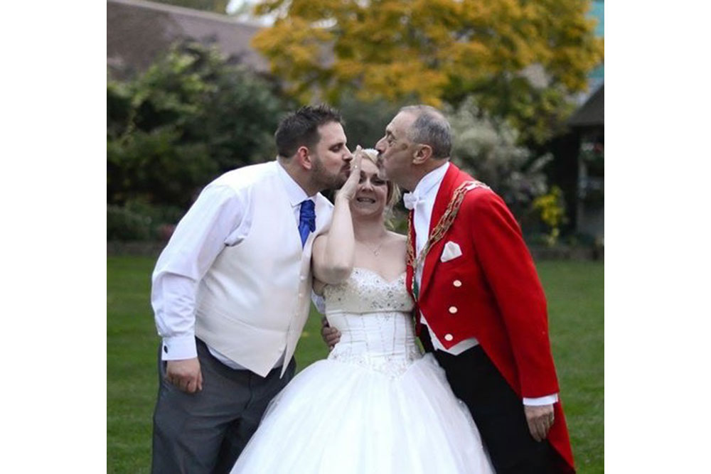 Toastmaster with Bride and Groom